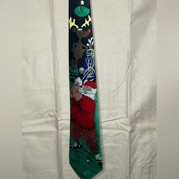 dino ramaro Other - Handmade Dino Romaro Christmas tie featuring Santa golfing reindeer holiday